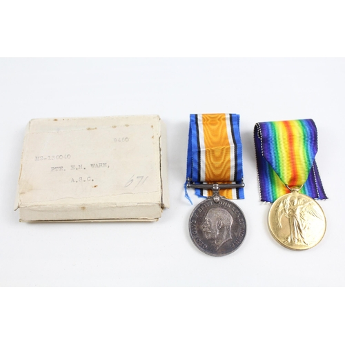 2284 - A boxed WWI British medal pair presented to M2-136040 Pte. E.H. Ware A.S.C.