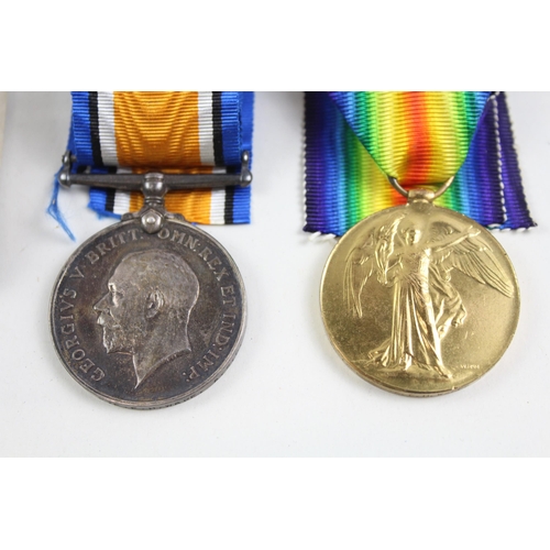 2284 - A boxed WWI British medal pair presented to M2-136040 Pte. E.H. Ware A.S.C.