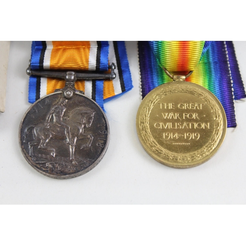 2284 - A boxed WWI British medal pair presented to M2-136040 Pte. E.H. Ware A.S.C.