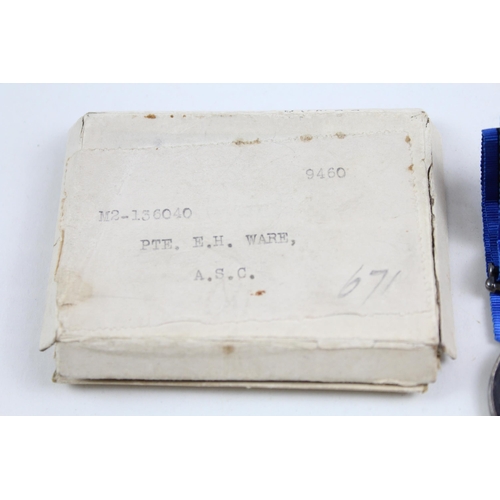 2284 - A boxed WWI British medal pair presented to M2-136040 Pte. E.H. Ware A.S.C.