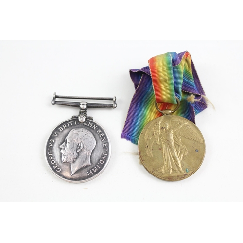 2287 - A WWI British medal pair presented to 155658 Gnr. W. Helm R.A.