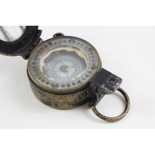 2291 - A WWII British military compass by TG & Co London, dated 1943