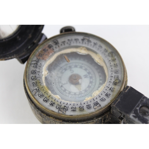 2291 - A WWII British military compass by TG & Co London, dated 1943