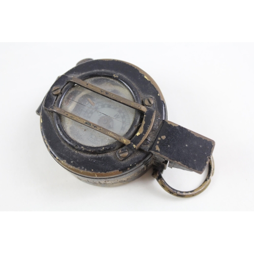 2291 - A WWII British military compass by TG & Co London, dated 1943