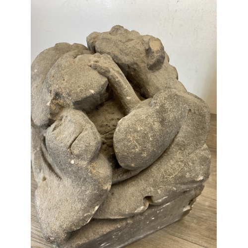 105 - Two medieval carved stone gargoyle corbels - largest approx. 39cm high x 25.5cm wide x 25.5cm deep