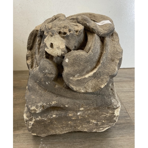 105 - Two medieval carved stone gargoyle corbels - largest approx. 39cm high x 25.5cm wide x 25.5cm deep