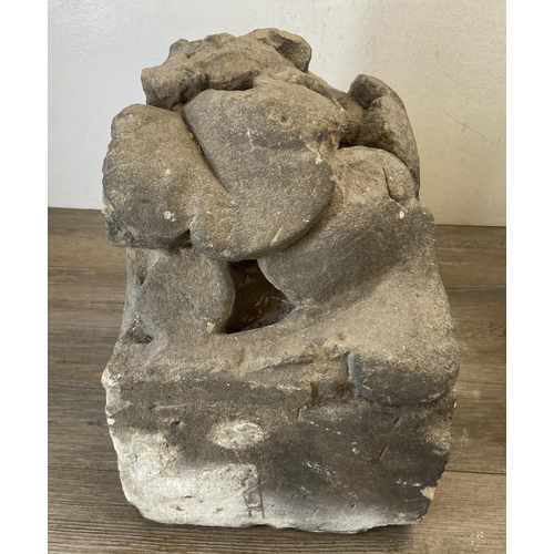 105 - Two medieval carved stone gargoyle corbels - largest approx. 39cm high x 25.5cm wide x 25.5cm deep