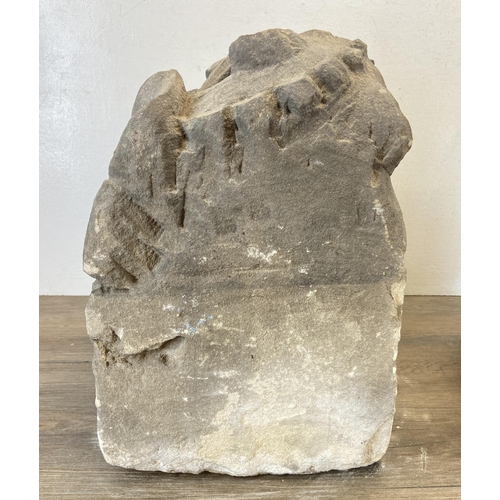 105 - Two medieval carved stone gargoyle corbels - largest approx. 39cm high x 25.5cm wide x 25.5cm deep