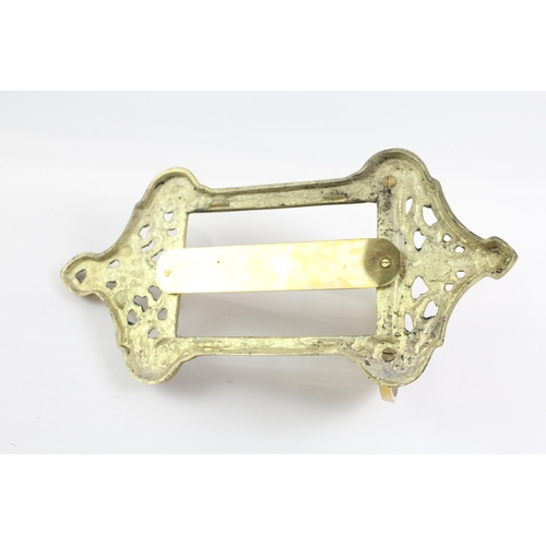 399 - A Victorian brass wall hanging mirror frame