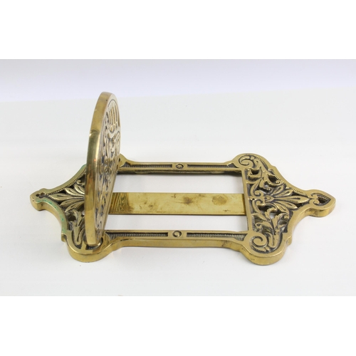 399 - A Victorian brass wall hanging mirror frame