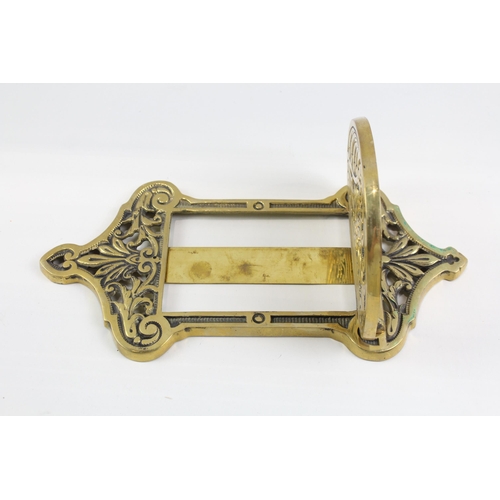 399 - A Victorian brass wall hanging mirror frame