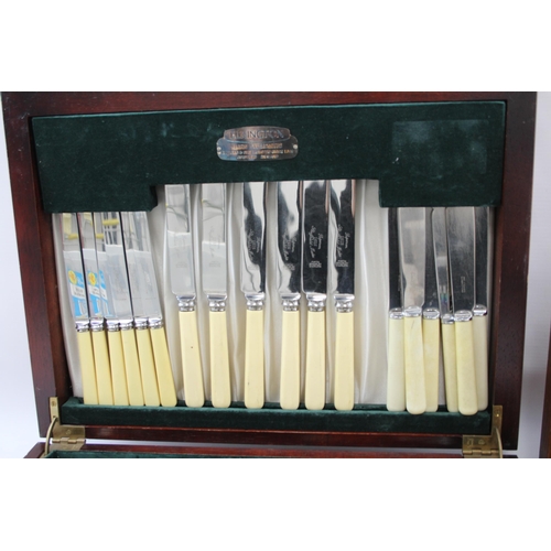 547 - Two wooden canteens of cutlery, one Elkington and one fish set