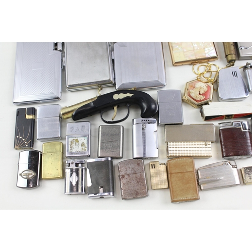 568 - A collection of cigarette and table lighters to include Ronson, Zippo, Colibri etc.