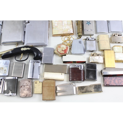 568 - A collection of cigarette and table lighters to include Ronson, Zippo, Colibri etc.