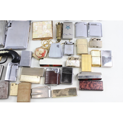 568 - A collection of cigarette and table lighters to include Ronson, Zippo, Colibri etc.