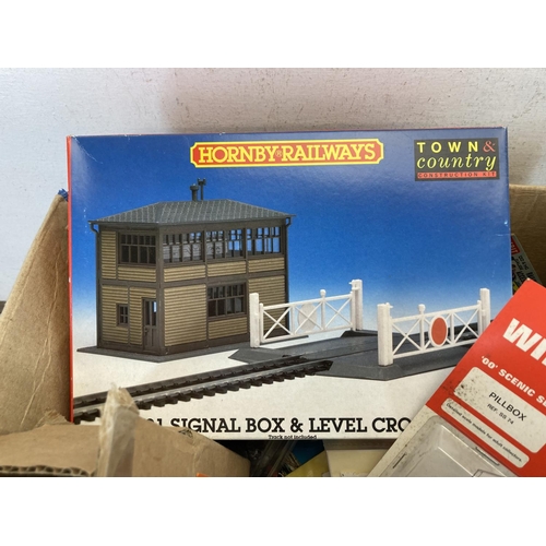 482 - A collection of model railway accessories to include Hornby, Town & Country Construction Kit, Merit ... 