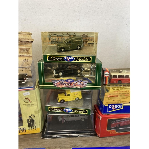 484 - A collection of boxed diecast model vehicles to include Corgi, Kyosho, Herpa, Norev etc.