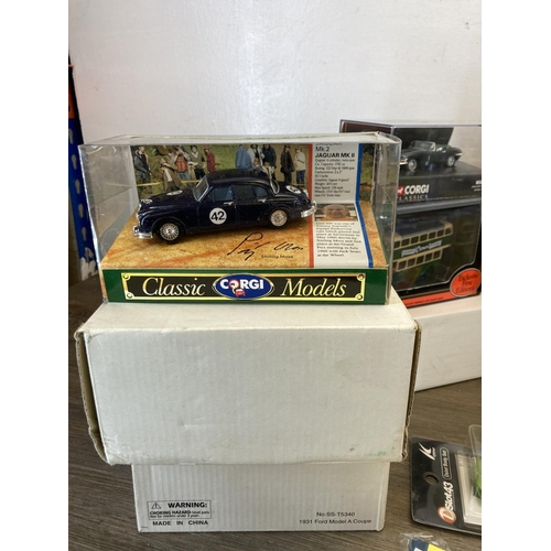 484 - A collection of boxed diecast model vehicles to include Corgi, Kyosho, Herpa, Norev etc.