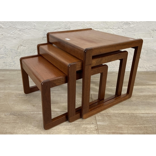 116 - A mid 20th century teak nest of three tables