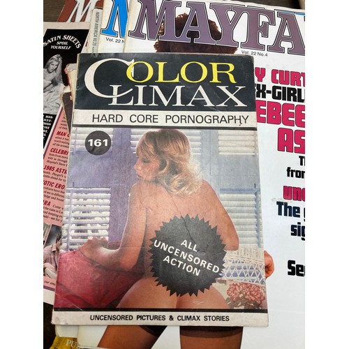 517B - A collection of vintage adult magazines and hardback books to include Playboy etc.