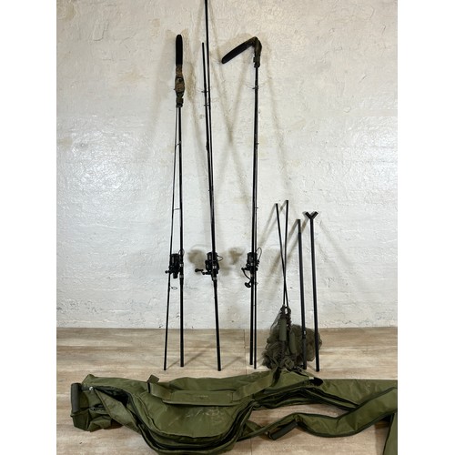 1009 - Five fishing items, Three Greys X-Flite 12' fishing rods with Daiwa Emblem 35 fishing reels, one Tra... 