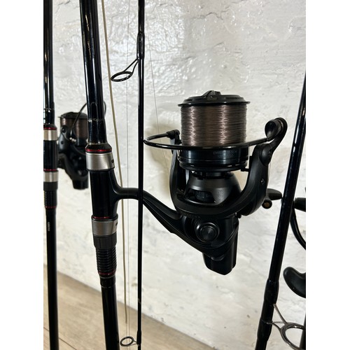 1009 - Five fishing items, Three Greys X-Flite 12' fishing rods with Daiwa Emblem 35 fishing reels, one Tra... 