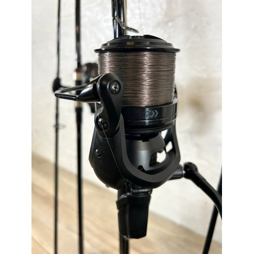 1009 - Five fishing items, Three Greys X-Flite 12' fishing rods with Daiwa Emblem 35 fishing reels, one Tra... 