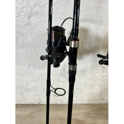 1009 - Five fishing items, Three Greys X-Flite 12' fishing rods with Daiwa Emblem 35 fishing reels, one Tra... 