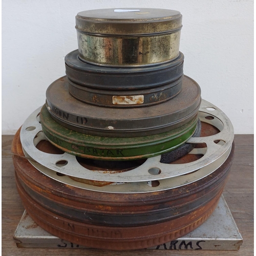 643 - A collection of cine reels to include cannisters marked 9.5mm silent 'Conquest of Sicily', 'Covered ... 