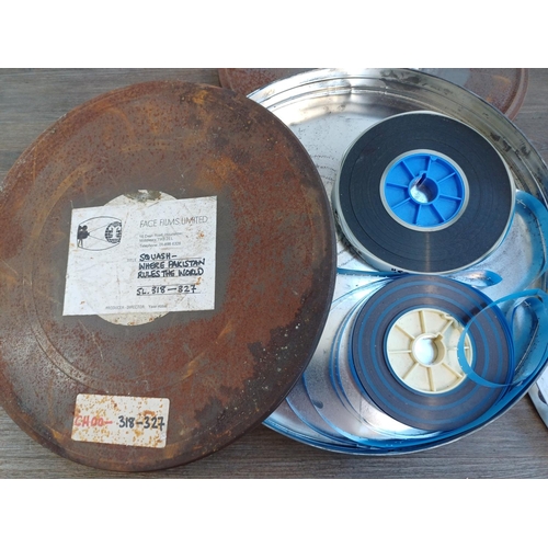 643 - A collection of cine reels to include cannisters marked 9.5mm silent 'Conquest of Sicily', 'Covered ... 