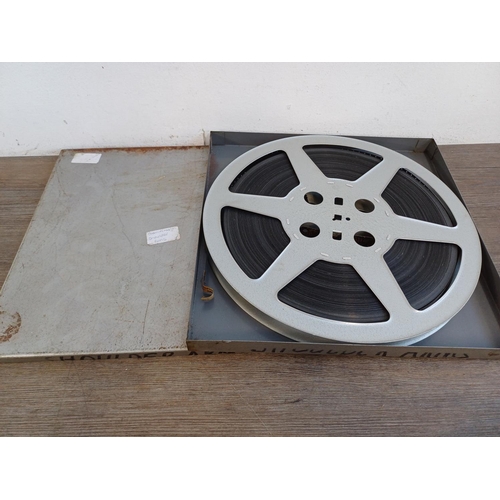 643 - A collection of cine reels to include cannisters marked 9.5mm silent 'Conquest of Sicily', 'Covered ... 