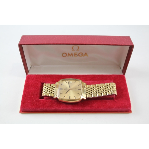 2186 - A 1970s boxed Omega De Ville gold plated automatic men's wristwatch