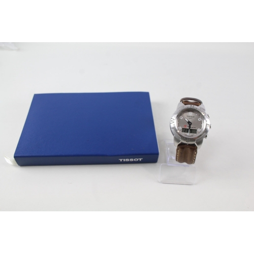 2188 - A Tissot T-Touch quartz men's wristwatch with book, 2004 catalogue and international warranty card