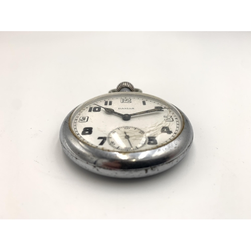 2158 - A vintage Damas hand wind military pocket watch inscribed G.S/T.P 40259 Broad Arrow