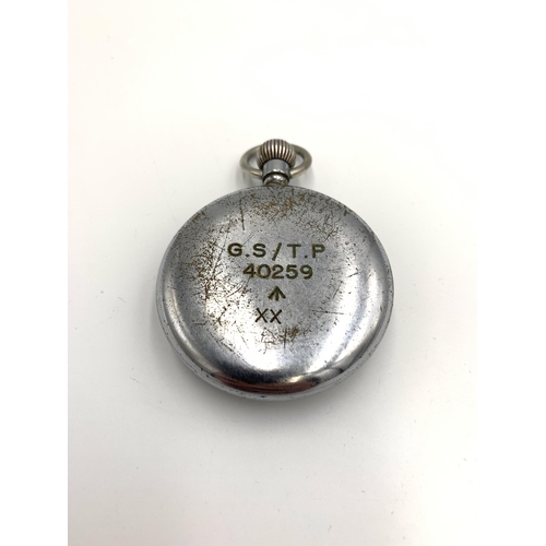 2158 - A vintage Damas hand wind military pocket watch inscribed G.S/T.P 40259 Broad Arrow