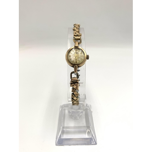 2162 - A vintage Gradus 9ct gold cased hand wind lady's wristwatch with rolled gold bracelet