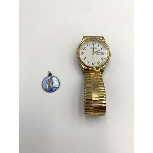 2171 - Two items, one boxed Sekonda quartz men's wristwatch and one silver and enamel St. Christopher penda... 