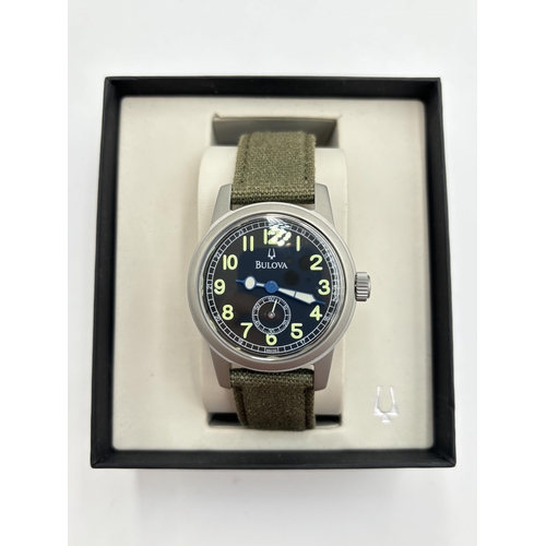 2180 - A boxed Bulova military style quartz men's wristwatch - ref no. C860736C