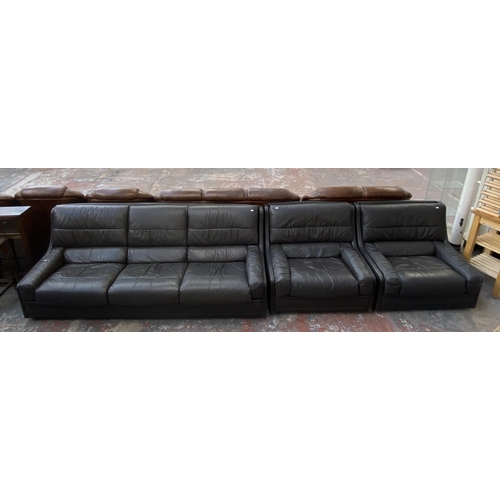 221 - A 1970s Gimson Slater Collection brown leather three piece lounge suite comprising three seater sofa... 