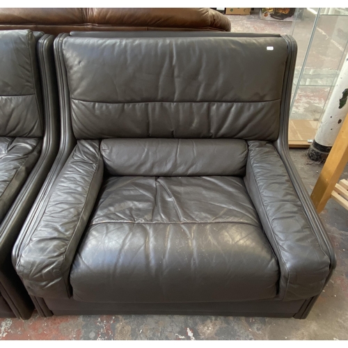 221 - A 1970s Gimson Slater Collection brown leather three piece lounge suite comprising three seater sofa... 