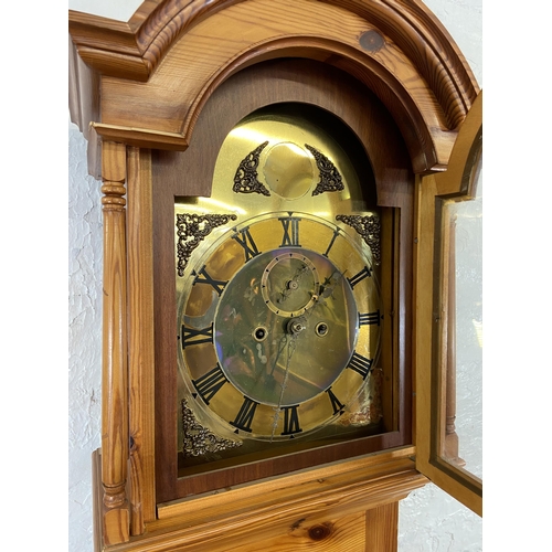 233 - Two clocks, one pine grandfather and one Smiths Westminster Chime granddaughter