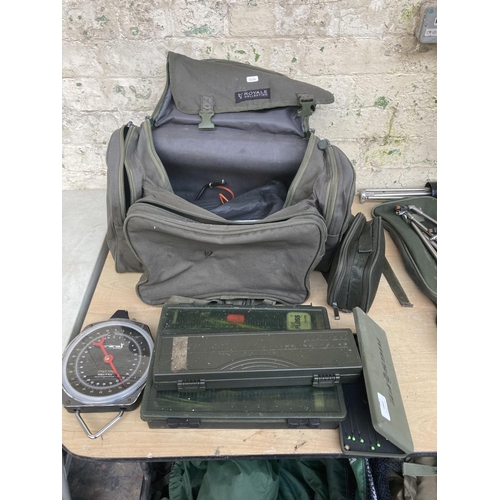 1005 - A collection of fishing items to include Crane Sports scales, Rigsafe box with contents, floats, bai... 