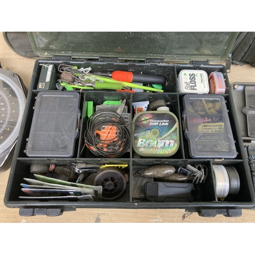 1005 - A collection of fishing items to include Crane Sports scales, Rigsafe box with contents, floats, bai... 