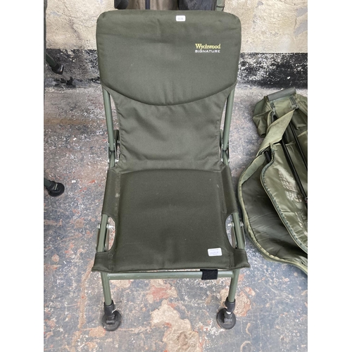 1009A - A collection of fishing items to include Wychwood signature folding chair, JRC Defender 42