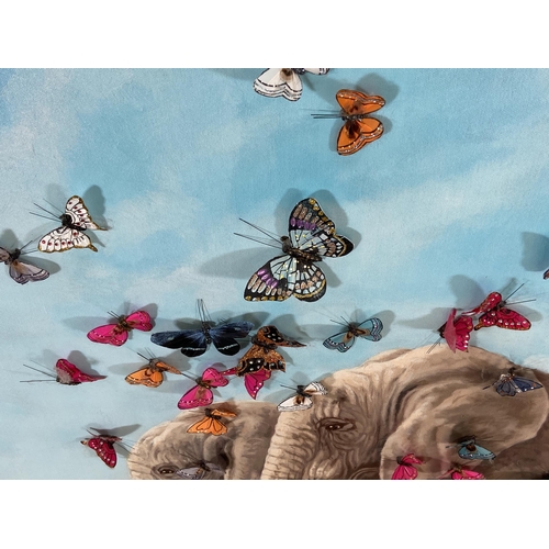 245 - A modern canvas print of elephants with 3D butterflies, signed lower left - approx. 120cm square