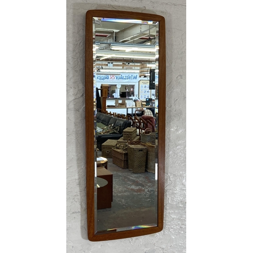 248 - A mid 20th century teak framed bevelled edge wall mirror - approx. 92cm high x 36cm wide