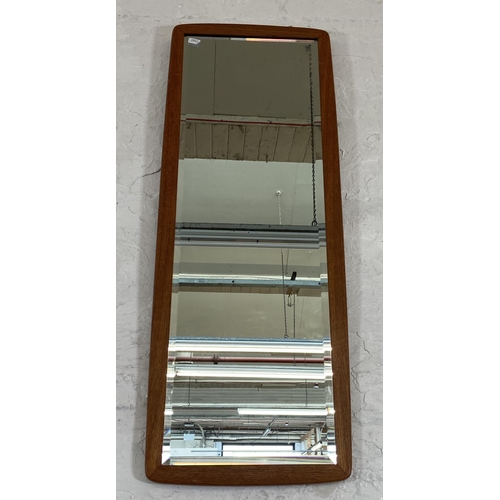 248 - A mid 20th century teak framed bevelled edge wall mirror - approx. 92cm high x 36cm wide