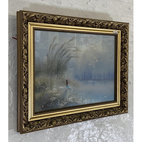 258 - A mid/late 20th century gilt framed oil of a young girl by a lake - approx. 40cm high x 50cm wide