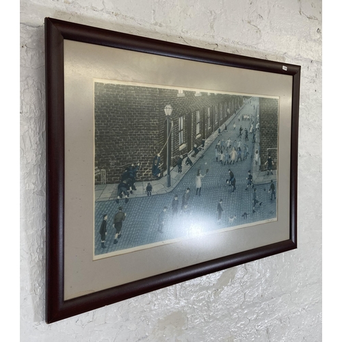 264 - A 20th century framed Tom Dodson signed northern art print with blind mark to lower left - approx. 7... 