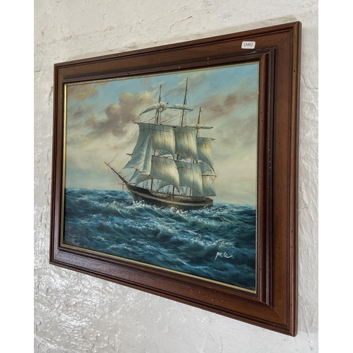 273 - A late 20th century framed oil on canvas of a Clipper ship at sea signed lower right - approx. 53cm ... 